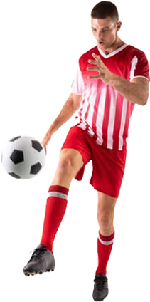 Fußballspieler mit Ball in Bewegung